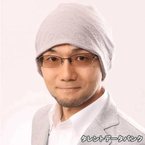 新居 祐一 の写真
